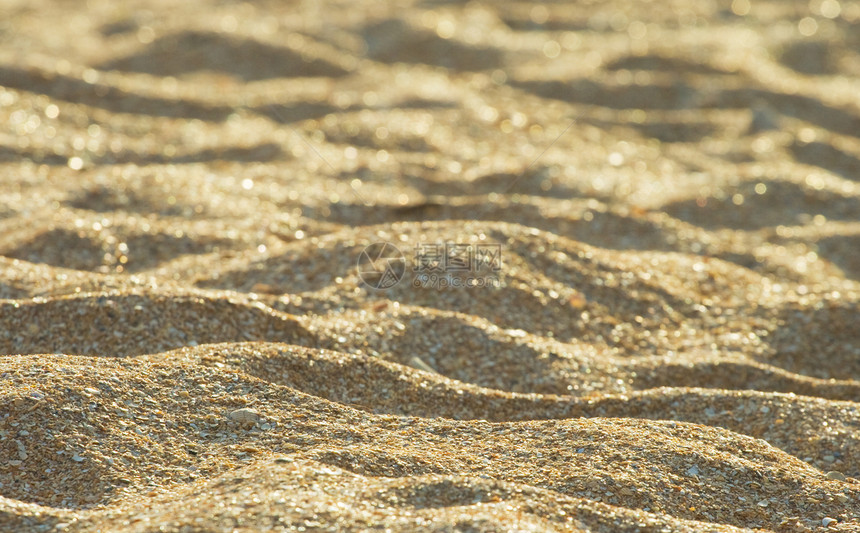 砂背景褐色水平波纹黄色涟漪橙子海浪日落沙丘热带图片