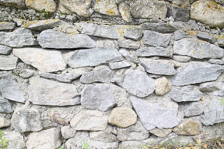 旧石墙褐色石头灰色粉色棕色背景图片