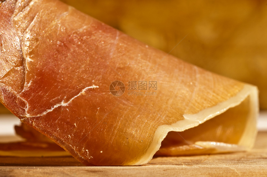 西班牙汉姆贾蒙塞拉诺熟食红色香肠猪肉食物塔帕火腿宏观起动机图片