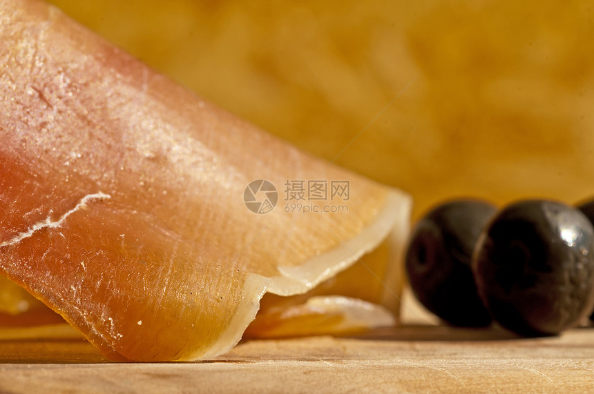 西班牙汉姆贾蒙塞拉诺熟食黑色塔帕起动机火腿宏观食物猪肉香肠图片
