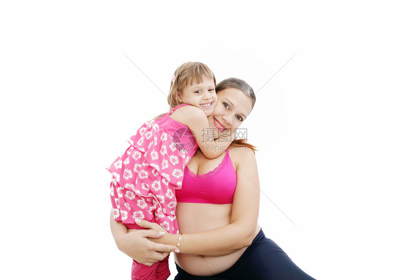 与女儿一起怀孕的美丽的孕妇 孤立在白面包上喜悦妈妈成人兄弟生活拥抱感情女性姐姐家庭图片