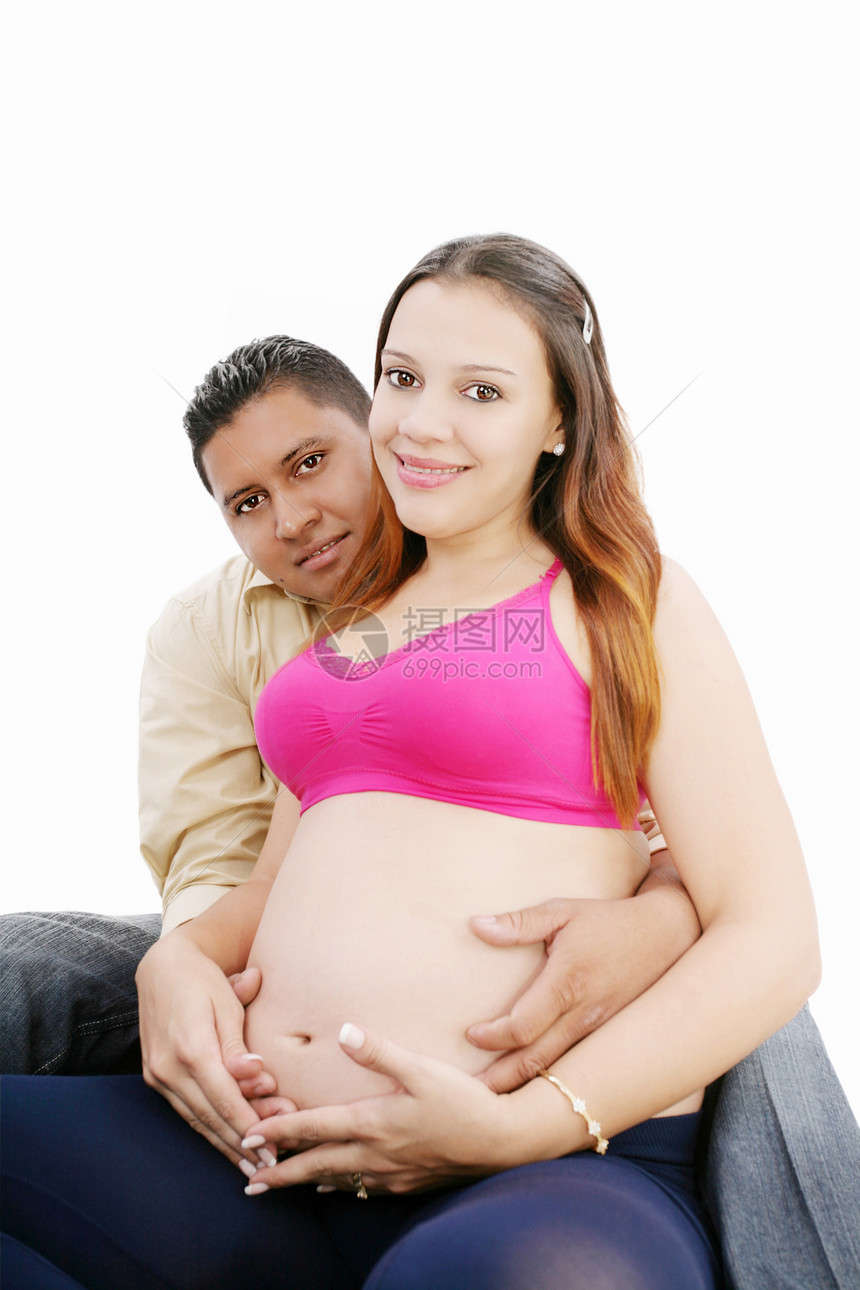 和丈夫一起快乐的怀孕美丽的女人图片