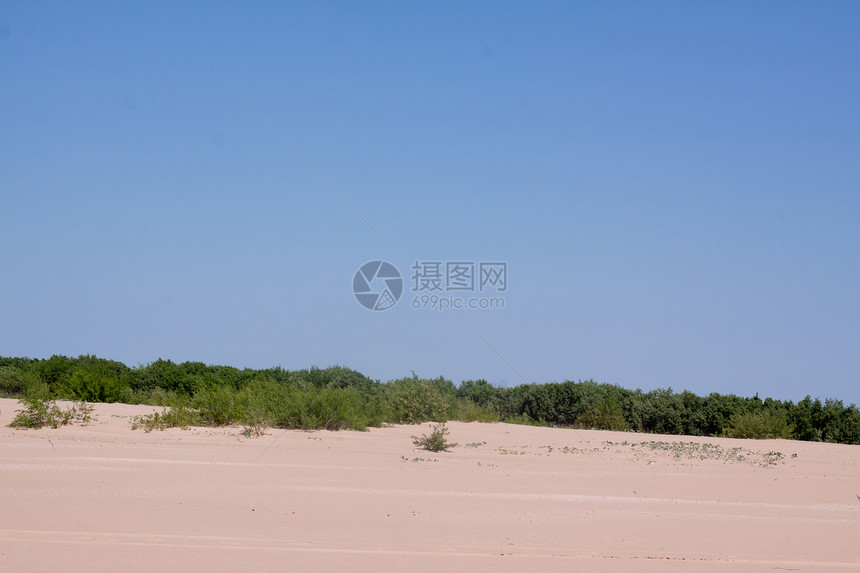 海滩蓝色衬套阳光白色水平天空晴天图片