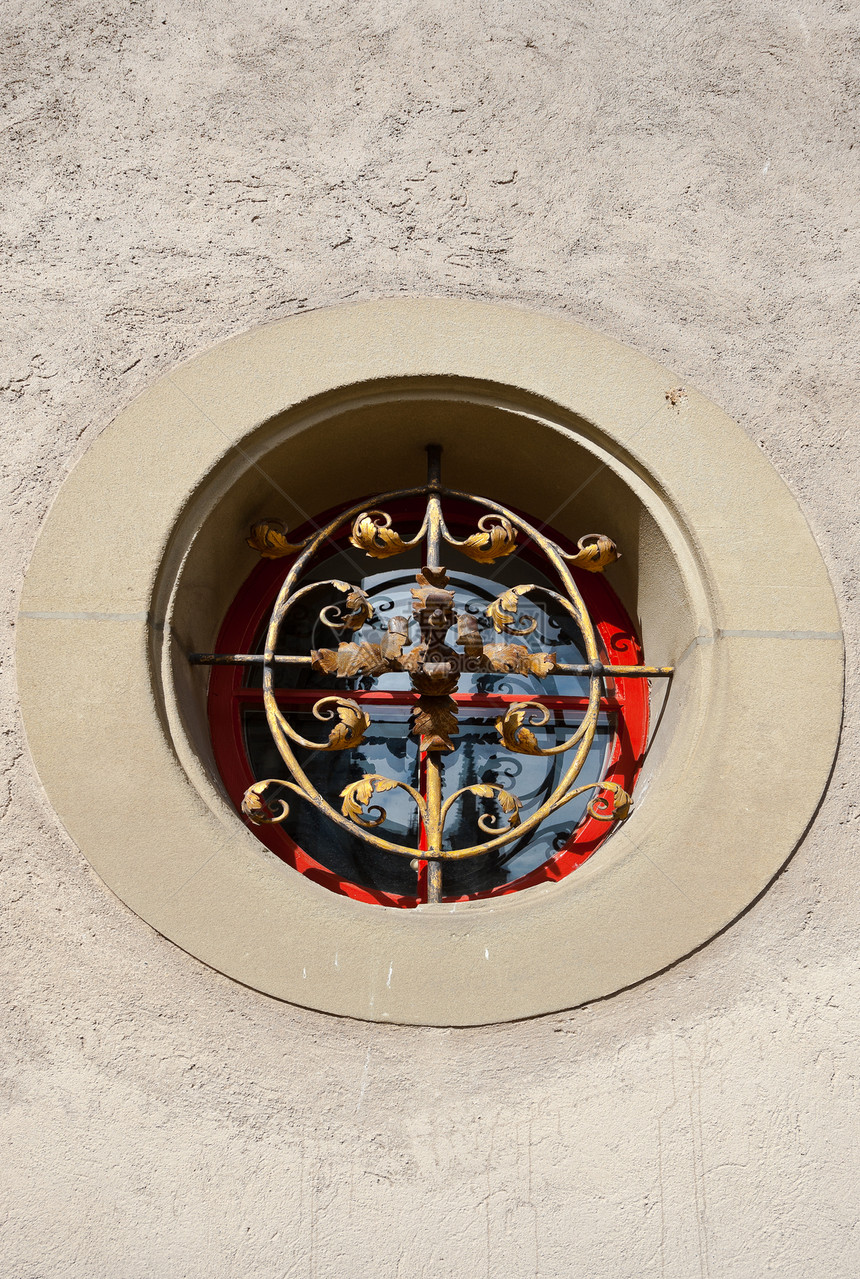 圆圆窗口曲线框架阴影建筑学历史性青铜器城市窗户圆圈金属图片