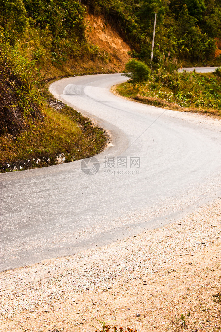 通往山谷的道路假期曲线岩石旅行运输沥青砂岩红色路线蓝色图片