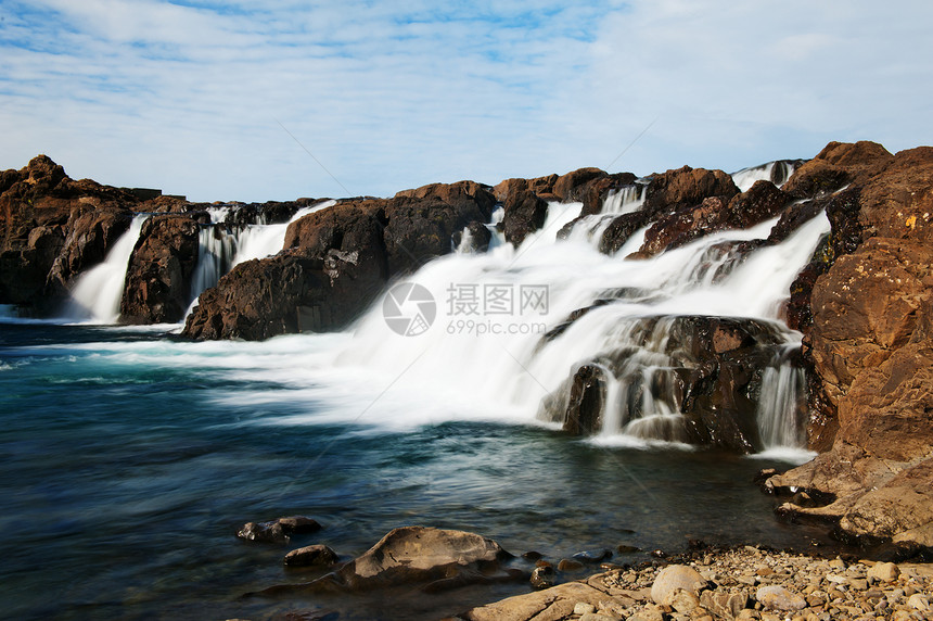 冰岛瀑布天空海浪天蓝色石头地质学岩石蓝色溪流冰川荒野图片