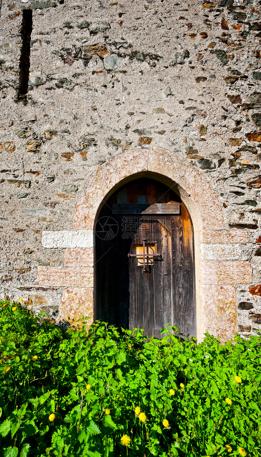 堡垒衬套历史石墙文化阳光风格安全房子入口木头图片