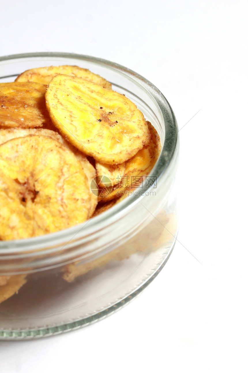 一碗香蕉薯片营养小吃美食白色油炸玻璃黄色食物芭蕉筹码图片
