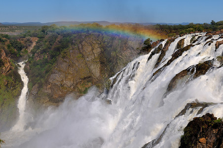 纳米比亚鲁阿卡纳瀑布戏剧性急流苦烯科兰巨石洪水岩石峡谷枯烯彩虹背景图片