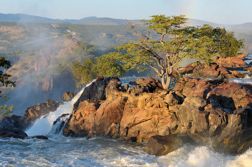 纳米比亚鲁阿卡纳瀑布日出瀑布急流岩石戏剧性洪水彩虹橙子科兰苦烯巨石图片