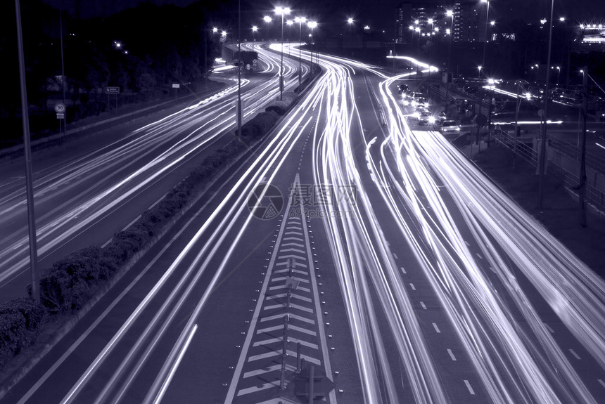 城市夜间交通车辆立交桥车道运输旅行路灯速度运动街道过境图片