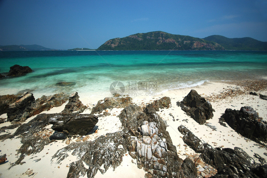 洛基海滩阳光冲浪假期旅行海浪场景天堂支撑海洋热带图片