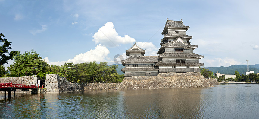 松本城堡建筑日落防御蓝色护城河天空乌鸦石头地标遗产图片