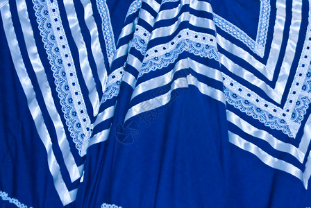 墨西哥蓝色衣服 配有子和带蕾丝的墨西哥蓝礼服背景图片