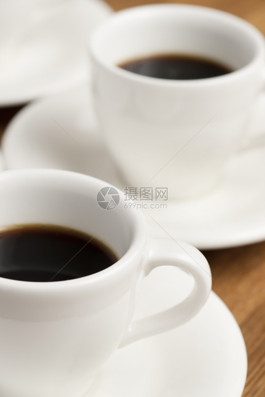 咖啡杯茶托杯子咖啡店白色黑色休息桌子咖啡食物图片