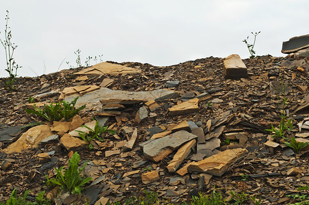用悬崖倾卸重负矿业材料倾倒石板平板石头岩石背景图片