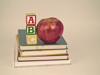 苹果块儿童书籍ABC块和苹果Sepia风格图书孩子们幼儿园字母红色阅读老师故事书学习学校背景