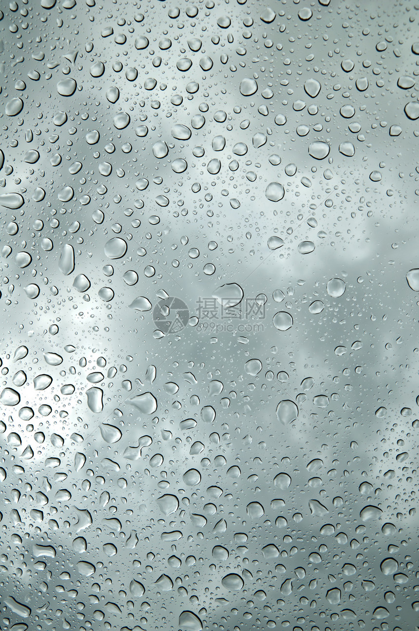 水滴背景飞沫蓝色液体玻璃圆圈气泡涟漪雨滴风暴窗户图片