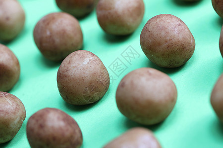 马铃薯土豆小吃白色糖果团体甜点食物粉末圆形杏仁背景图片