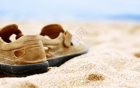 鞋子鞋海滩季节运动凉鞋旅行海洋背景图片