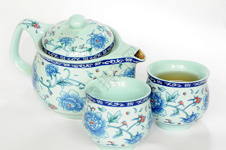中国陶器挑逗制品白色茶具水平时间飞碟情调异国饮料陶瓷背景图片