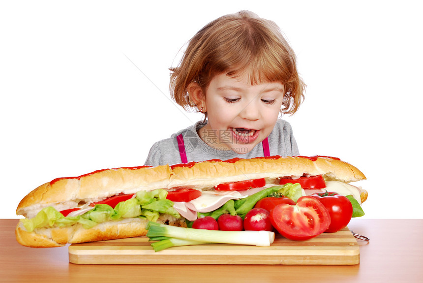饥饿的小女孩尝试吃大三明治图片