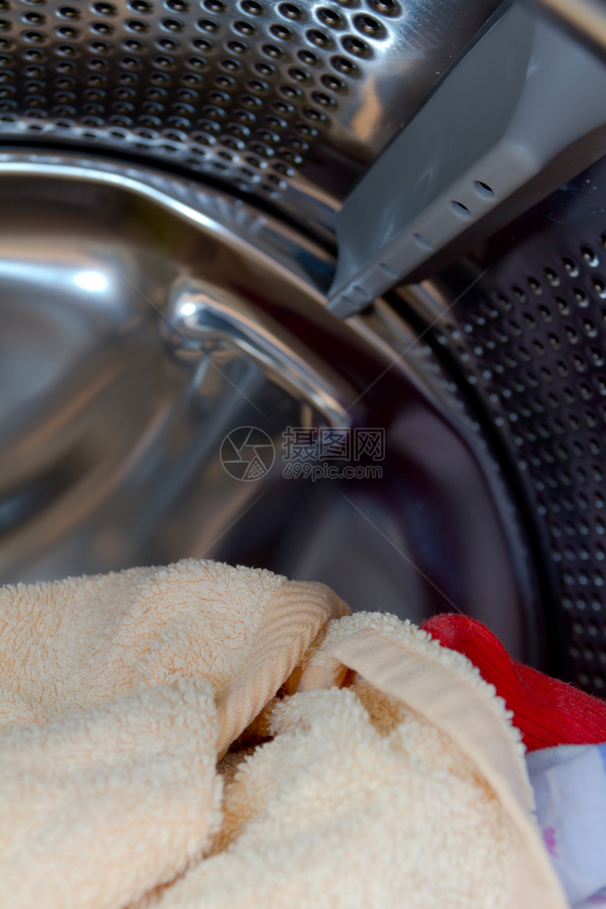 洗涤机机家庭洗衣卫生机器器具棉布技术按钮蓝色衣服图片