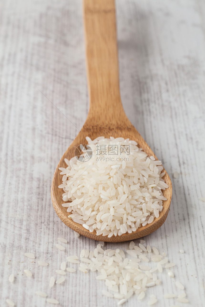 大米稻米营养饮食粮食桌子美食食物勺子白色图片