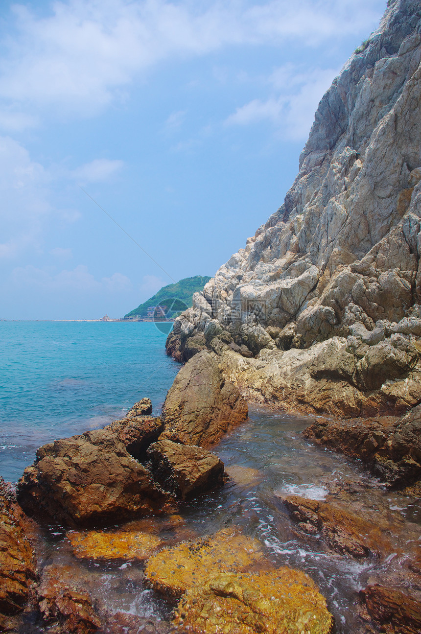 中国南部深圳市美丽的勺子漂流海岸线安全树叶浪花土地火山半岛生存山麓杂草图片