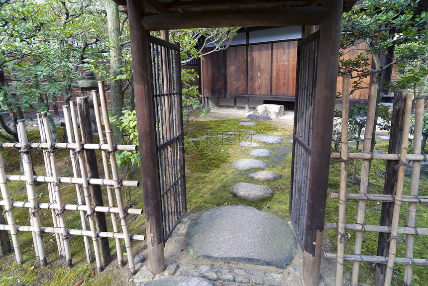 花园入口石头房子传统文化栅栏竹子图片