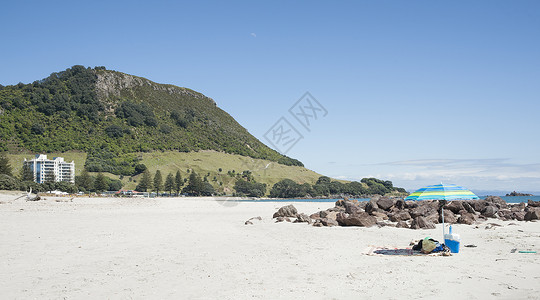 白沙滩场景海岸旅行蓝色海岸线海滩岩石天空风景支撑背景图片