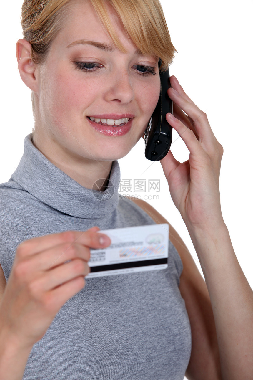 和信用卡公司的电话上女人的电话图片