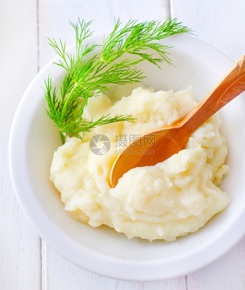 白碗里的土豆泥饮食淀粉胡椒小吃桌子树叶烹饪托盘盘子土豆图片