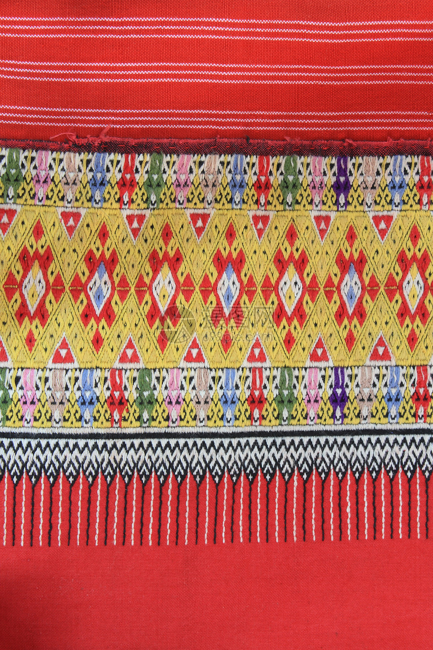 手工编织的泰文风格织布贴近纹理织物衣服丝绸传统色调民间棉布染料墙纸纺织品图片