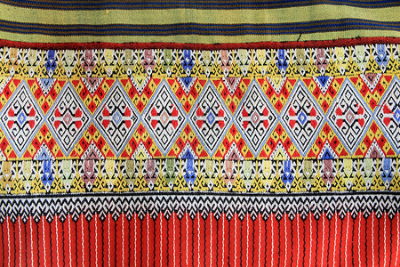 手工编织的泰文风格织布贴近纹理墙纸织物棉布染料纺织品民间色调衣服丝绸传统背景