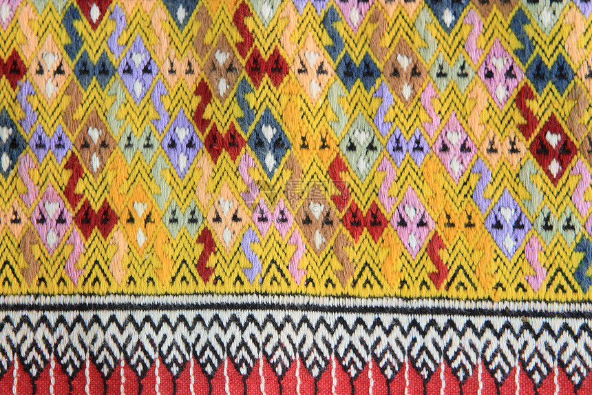 手工编织的泰文风格织布贴近纹理传统墙纸染料色调棉布织物衣服民间纺织品丝绸图片