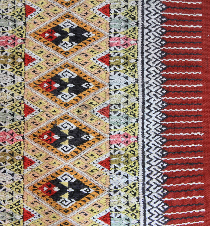 手工编织的泰文风格织布贴近纹理纺织品传统衣服丝绸色调墙纸织物棉布染料民间图片
