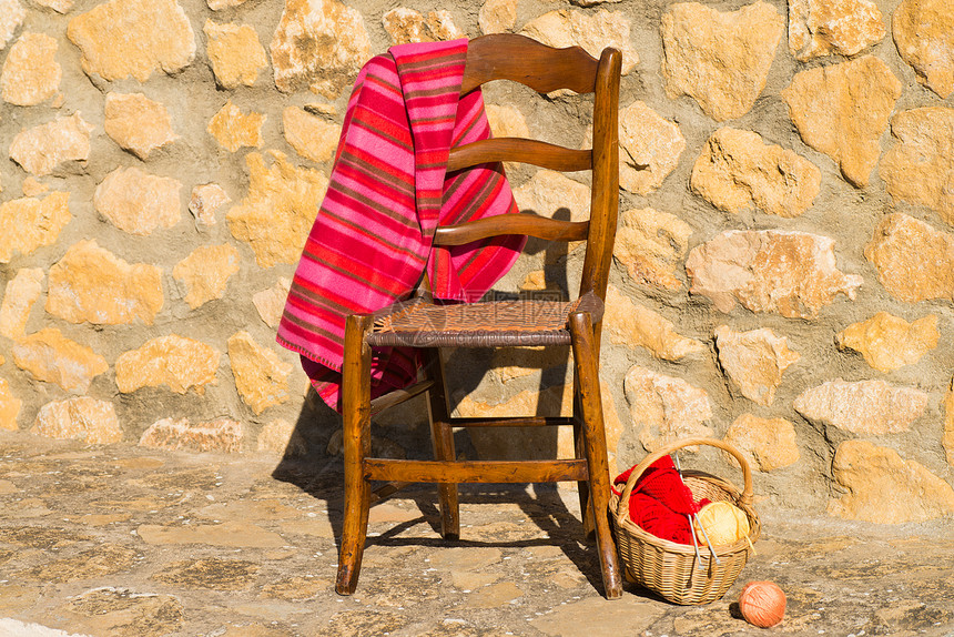 编织针织球毛爱好石墙季节性时间空闲工艺椅子手工业图片