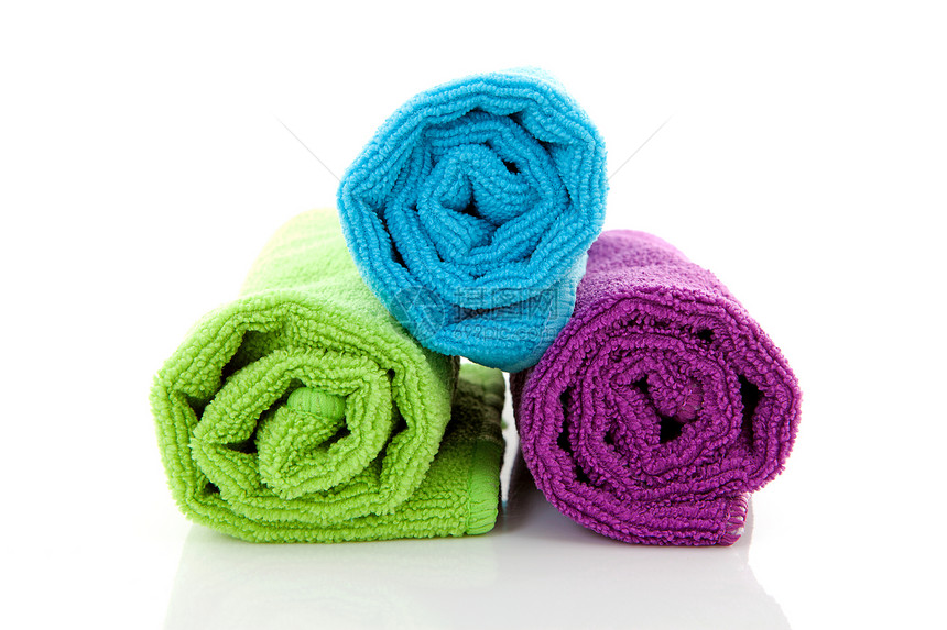 彩色的滚毛巾紫色蓝色纺织品毛巾绿色淋浴浴室棉布图片