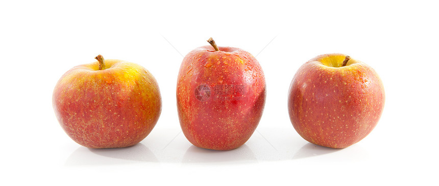 白色背景上三个红色苹果维生素水果食物饮食图片