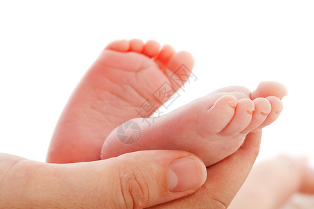 拥有新生儿婴儿脚的母亲生活孩子新生脚趾背景图片