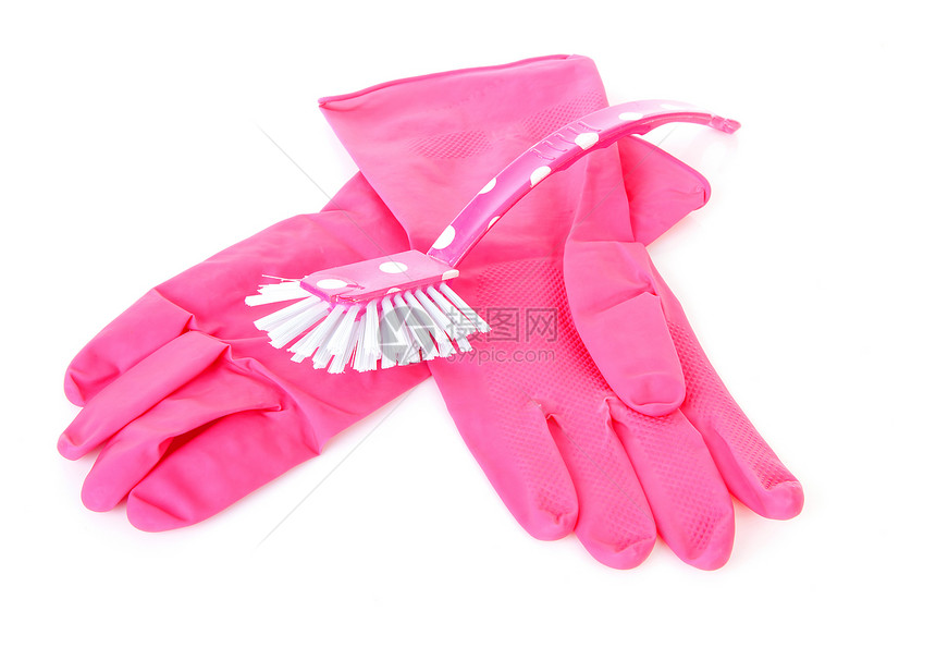 一对粉红色家用手套和洗碗刷图片