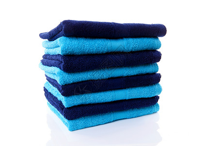 蓝毛巾堆背景图片