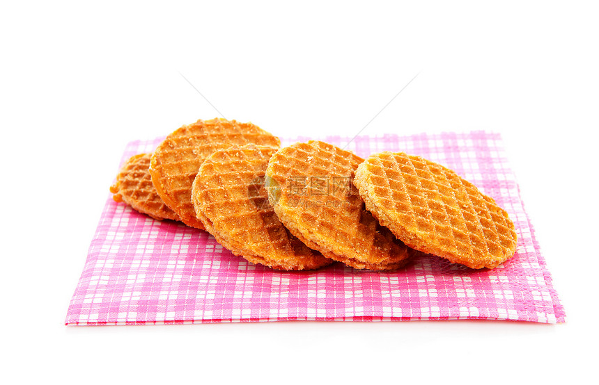 餐巾纸上典型荷兰支架加糖浆食物焦糖小吃餐巾饼干面包胡扯糖果图片