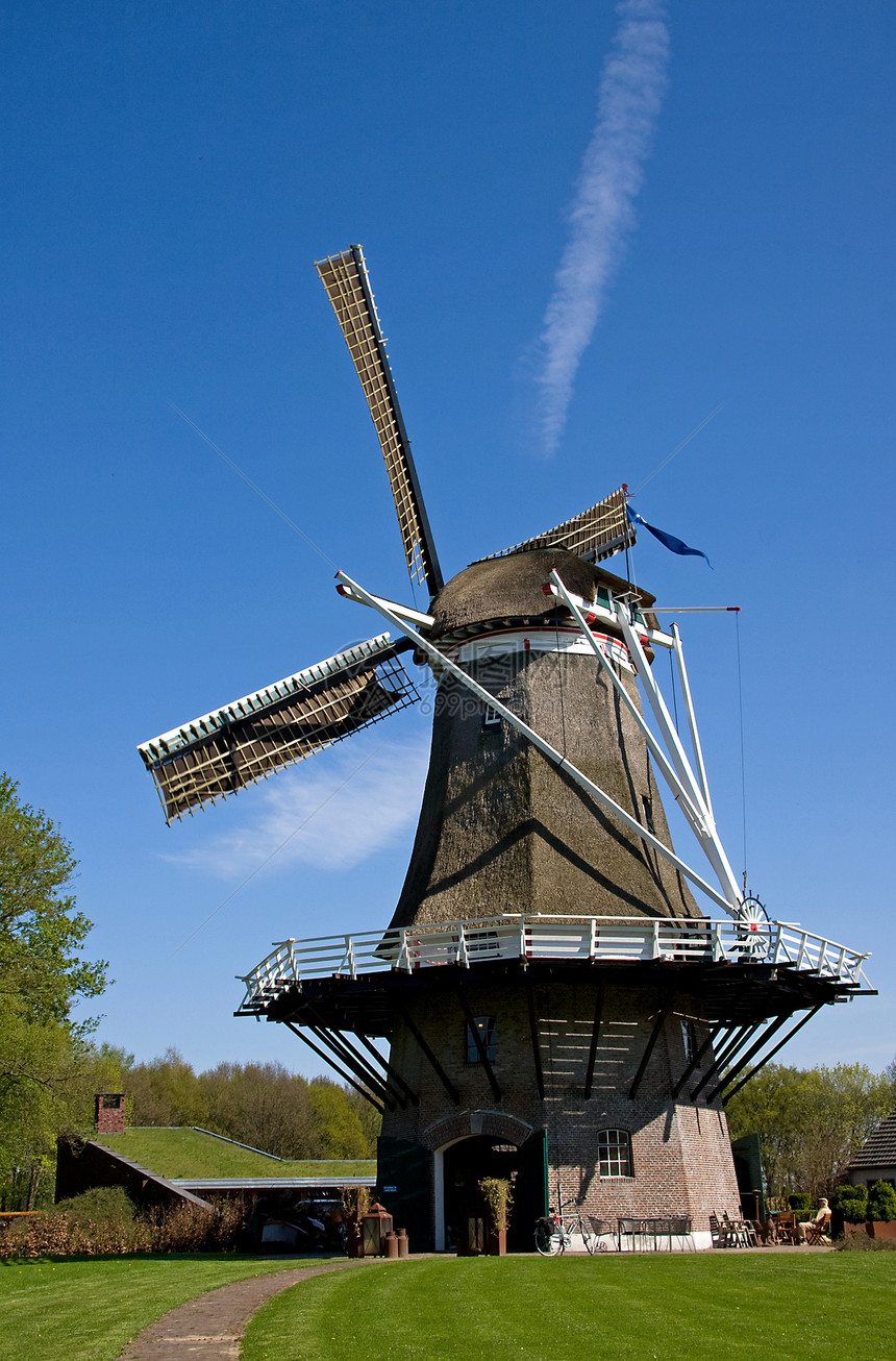 荷兰风车晴天上诉翅膀传统铣削假期天空历史旅游旅行图片