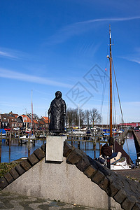 威廉米娜王后雕像天空环境房屋码头女王航行背景图片