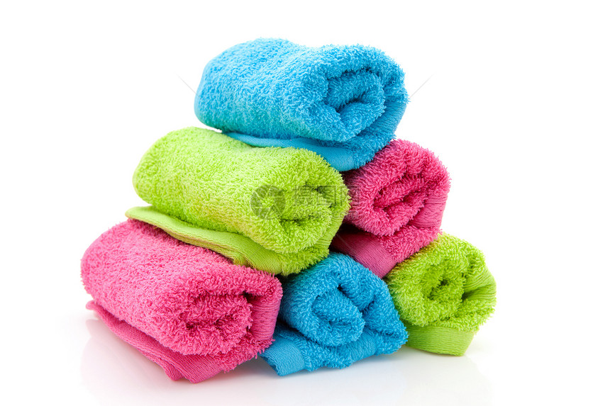 堆叠多彩的毛巾绿色洗澡蓝色纺织品粉色棉布浴室淋浴图片