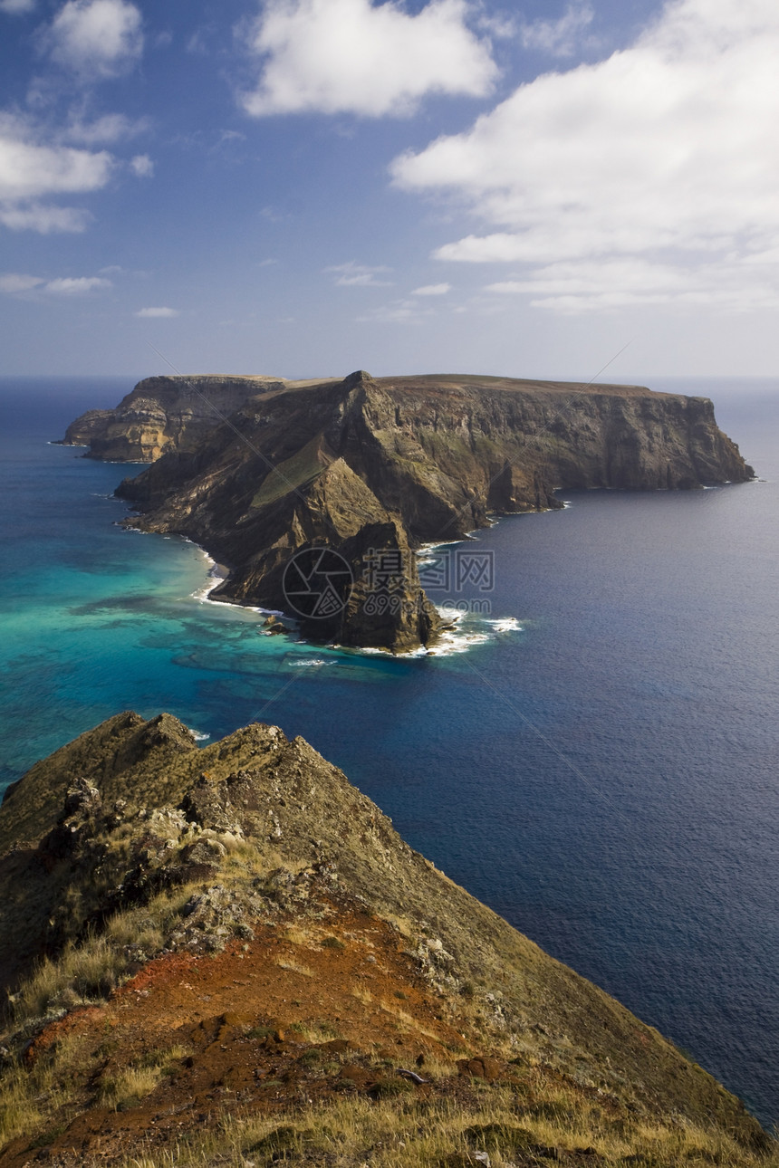 马德拉群岛石质支撑海岸圣港晴天蓝色岩石天空图片