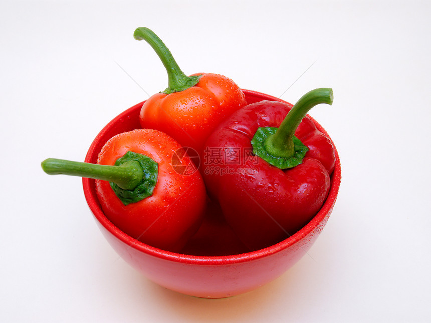 三个红色的paprikas胡椒食物营养辣椒饮食烹饪蔬菜图片