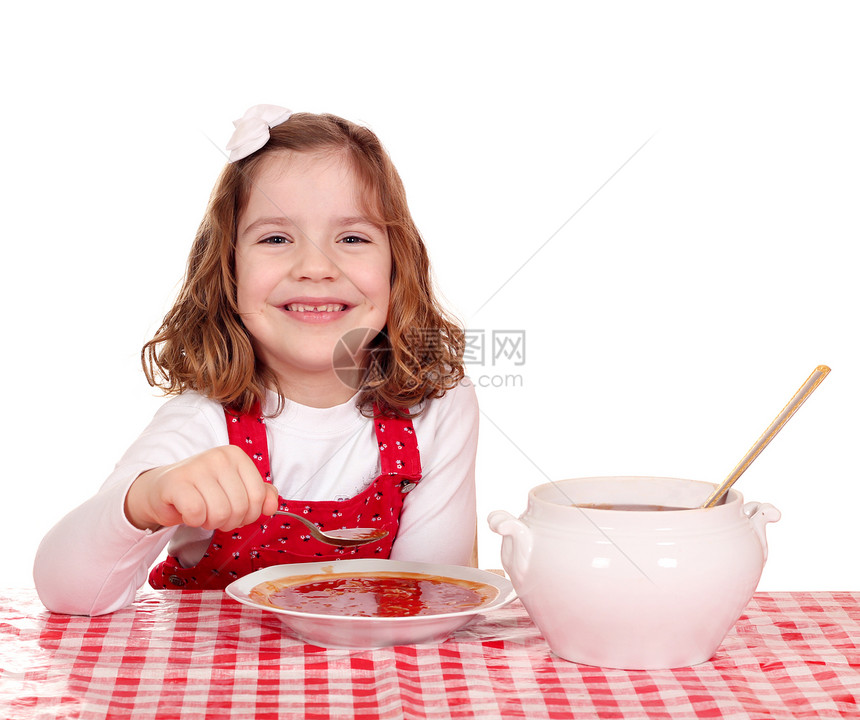 快乐的小女孩 吃红番茄汤图片